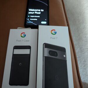 Google Pixel 7 like new with manuals, box, charger.  Obsidian with black case